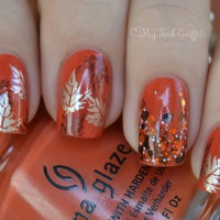 attractive-orange-nail-art-design-idea-with-brown-and-silver-fall-flowers-motif-and-rhinestones-ornaments-fall-nail-art-designs